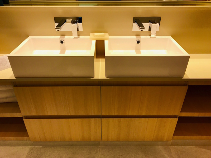 Convenient His & Her Double-Sinks with plenty of space to stow toiletries